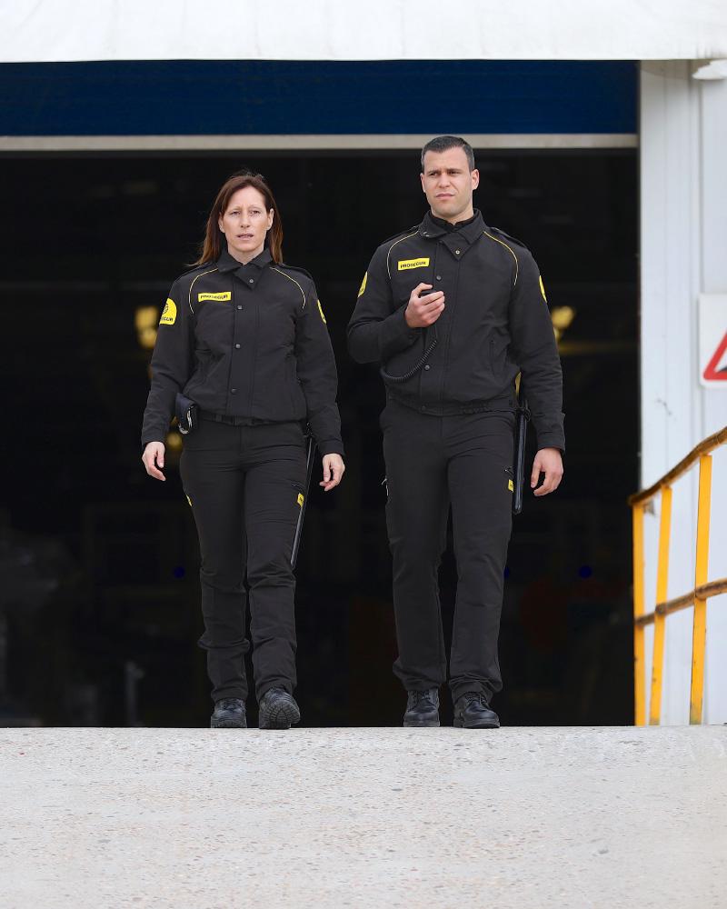 Prosegur Logistics Security Guards Two Prosegur security guards providing security guard services for a logistics warehouse