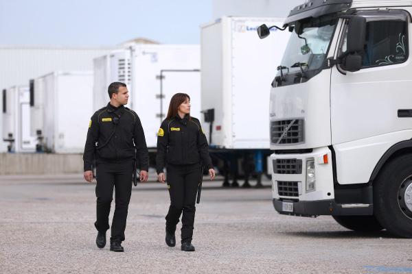 Two Logistics Security Officers Two Prosegur security officers on patrol for a logistics warehouse client